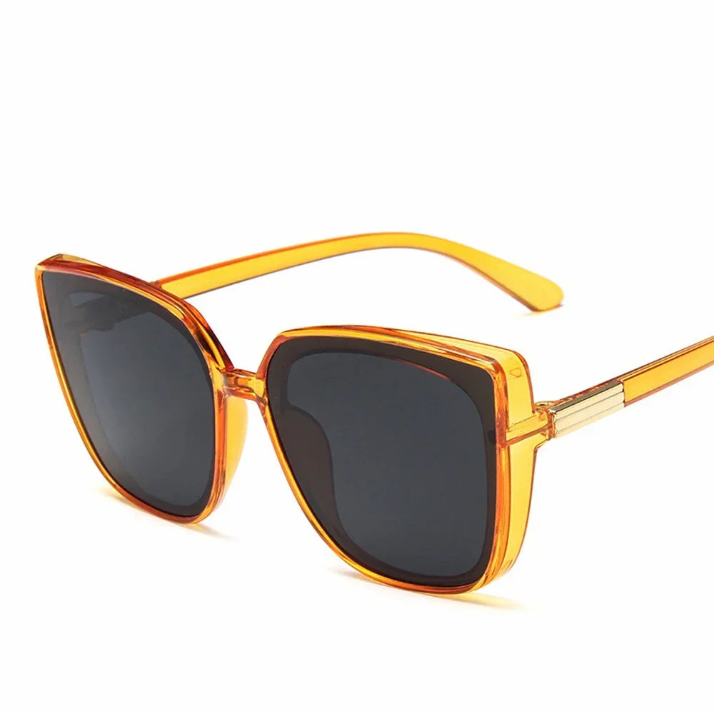 Nahla Oversized Cat Eye Sunglasses – Black Fashion Shades with Gold Detail and UV Protection