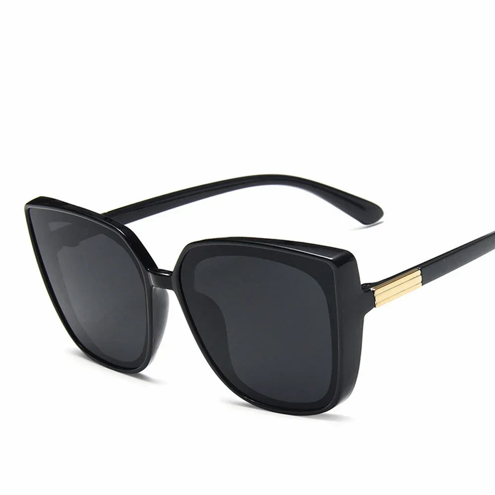 Nahla Oversized Cat Eye Sunglasses – Black Fashion Shades with Gold Detail and UV Protection