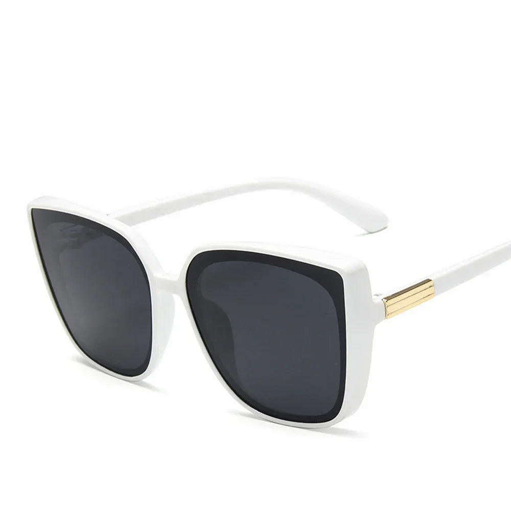 Nahla Oversized Cat Eye Sunglasses – Black Fashion Shades with Gold Detail and UV Protection