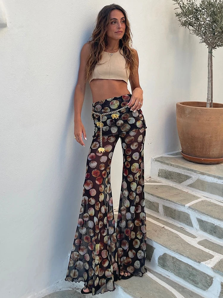Oraya Flared Mesh Trousers in Leopard & Abstract Print – Sheer High Waist Wide Leg Holiday Trousers for Women